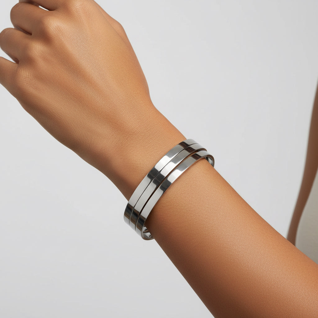 Two silver rings stacked on a white background